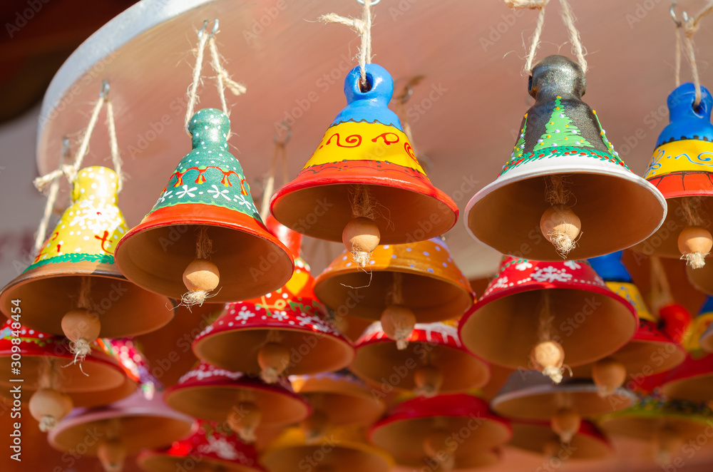 Obraz premium Ceramic handicrafts bells in the shop as souvenir