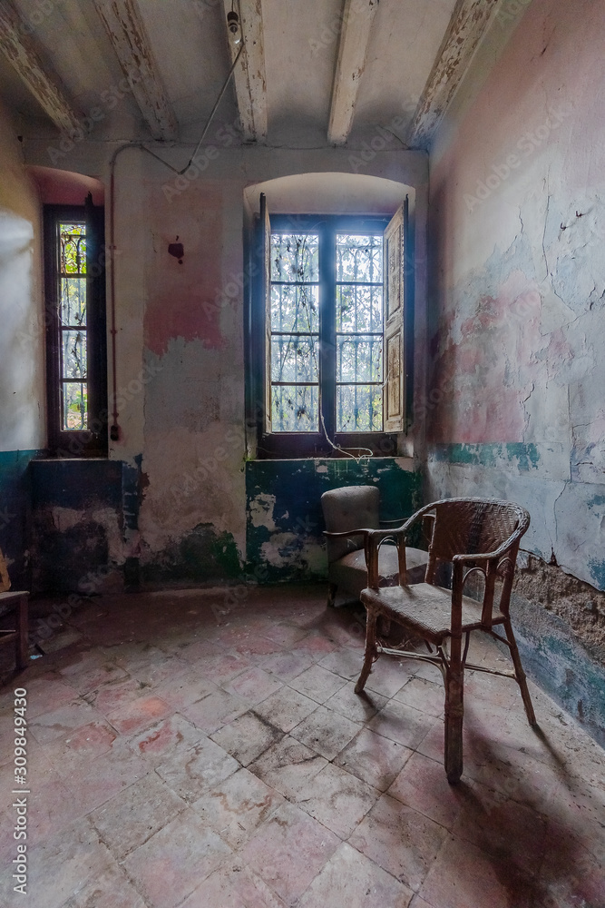 Dark room without people with some old furniture Dark room without people with some old furniture