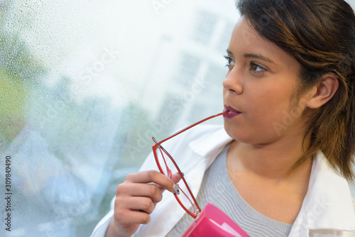 Photography picture of young woman thinking deeply