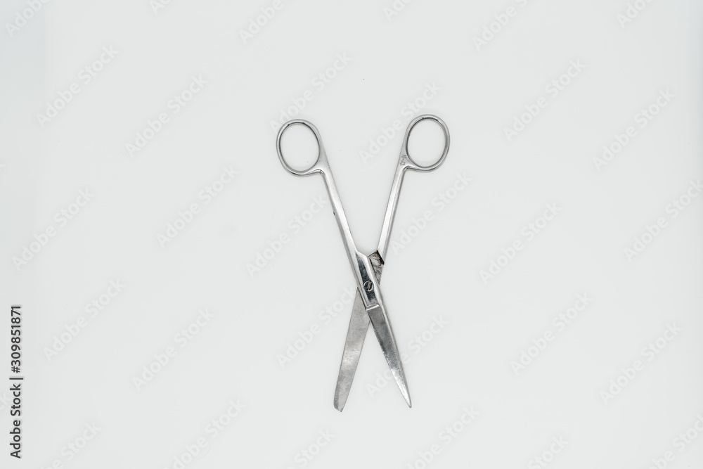 Scissors on a white background close-up