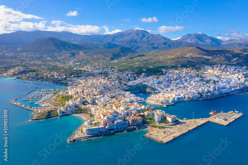 Agios Nikolaos, a picturesque coastal town with colorful buildings around the port in the eastern part of the island Crete, Greece.