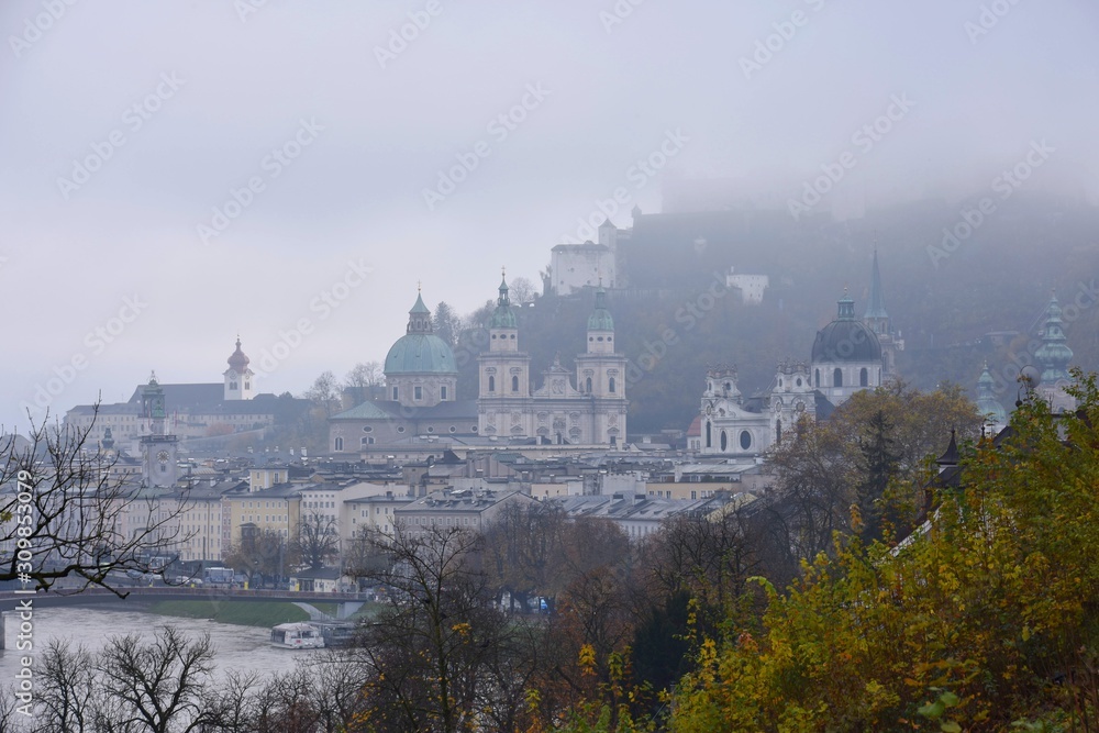 View on the Salzburg in fog - Austria