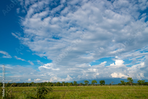 Country landscape with sunny day and blue sky with clouds in Colombia