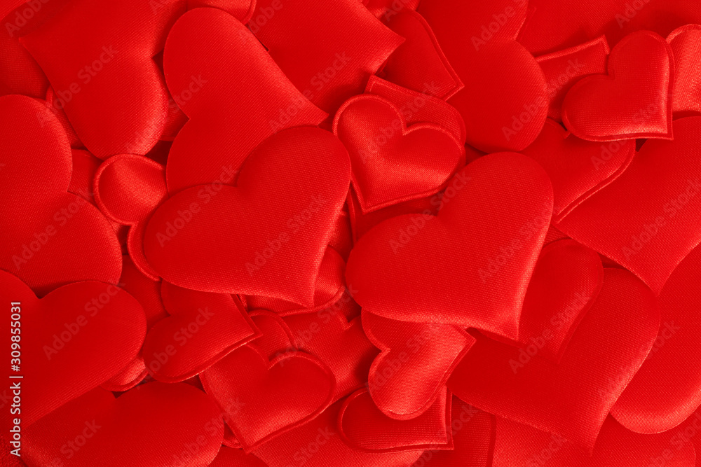 Red fabric hearts arranged randomly. Background Red fabric hearts arranged randomly. Background
