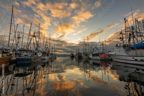 Beautiful sunrise reflection on Comox Fishermans Warf in Comox Valley, British Columbia, Canada