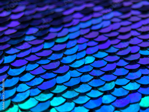 Background in the form of a texture of blue and green sequins. Materials for textiles  accessories. The use of catalogs of sewing accessories and other uses.