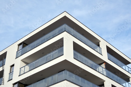 Modern and new apartment building. Multistoried modern, new and stylish living block of flats.