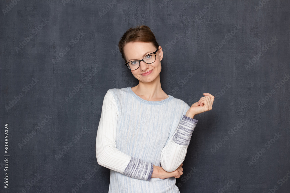 Portrait of happy satisfied cute girl standing in relaxed position Portrait of happy satisfied cute girl standing in relaxed position