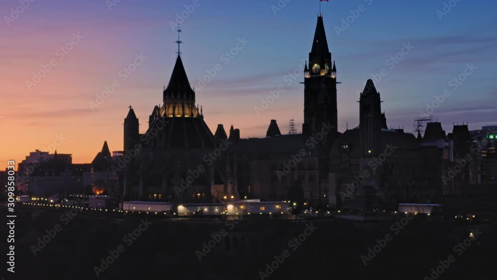 Aerial: the Library of Parliament and the Ottawa city skyline at sunrise. Ontario, Canada. 11 September 2019 Aerial: the Library of Parliament and the Ottawa city skyline at sunrise. Ontario, Canada. 11 September 2019