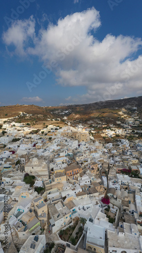 Aerial drone panoramic photo of small picturesque village of Emporeio in Santorini volcanic island, Cyclades, Greece © aerial-drone