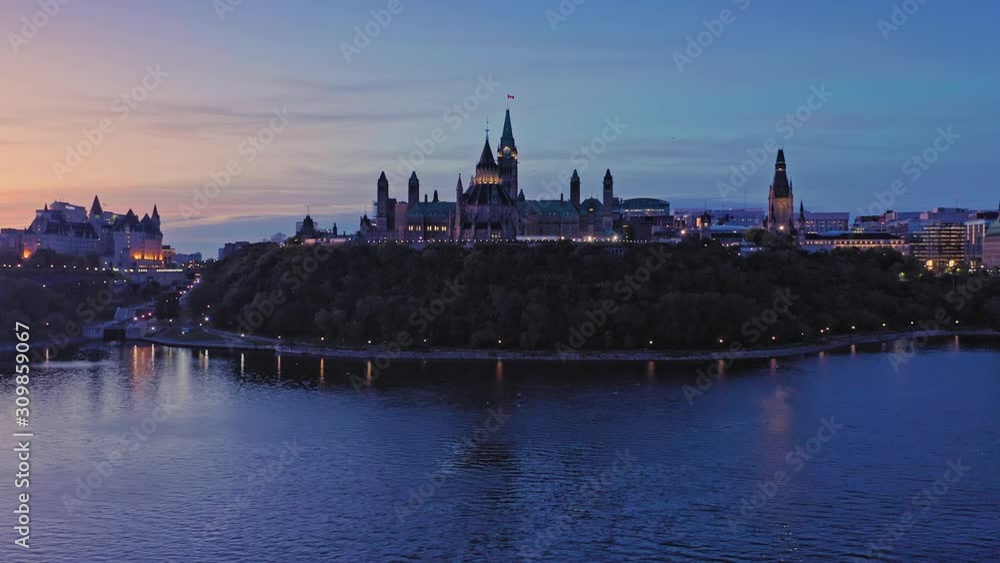 Aerial: the Library of Parliament and the Ottawa city skyline at sunrise. Ontario, Canada. 11 September 2019 Aerial: the Library of Parliament and the Ottawa city skyline at sunrise. Ontario, Canada. 11 September 2019