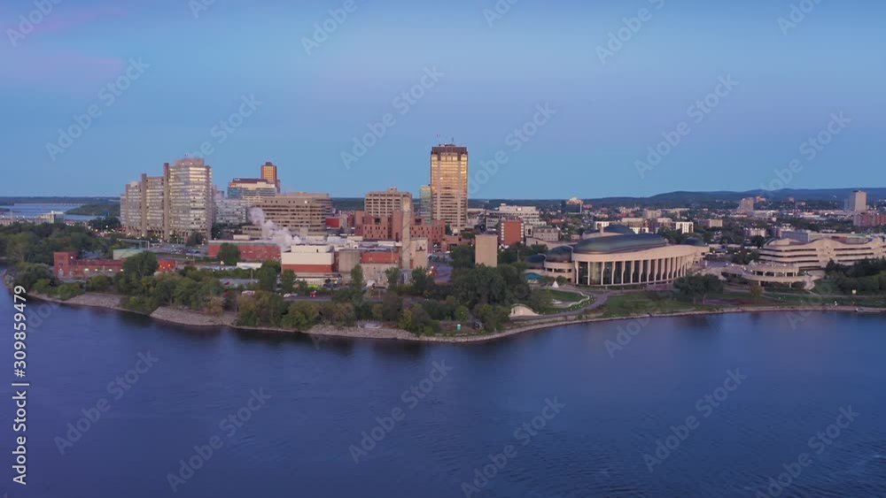 Aerial flying over the Ottawa city skyline at sunrise. Ottawa, Ontario, Canada. Aerial flying over the Ottawa city skyline at sunrise. Ottawa, Ontario, Canada.
