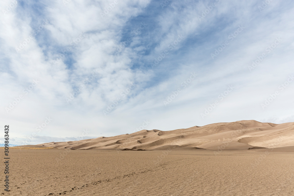 Landscape view of dunes at Great Sand Dunes National Park in Colorado, the tallest sand dunes in North America. Landscape view of dunes at Great Sand Dunes National Park in Colorado, the tallest sand dunes in North America.