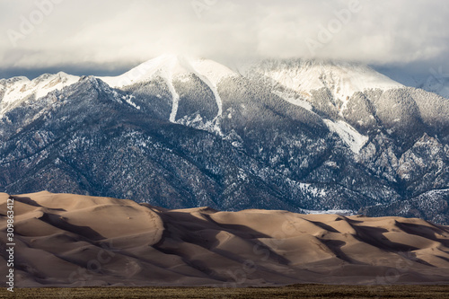 Fototapeta Naklejka Na Ścianę i Meble -  Landscape view of dunes at Great Sand Dunes National Park in Colorado, the tallest sand dunes in North America.