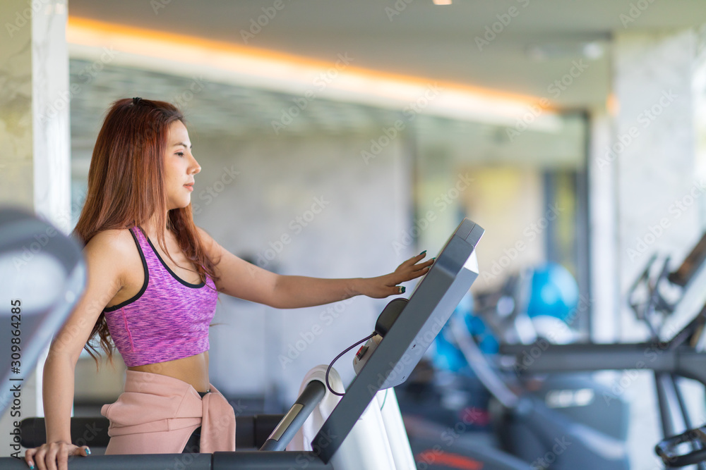 Young woman workout in gym healthy lifestyle Young woman workout in gym healthy lifestyle