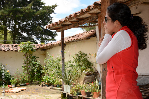 Mujer Latina en casa antigua chicamocha photo