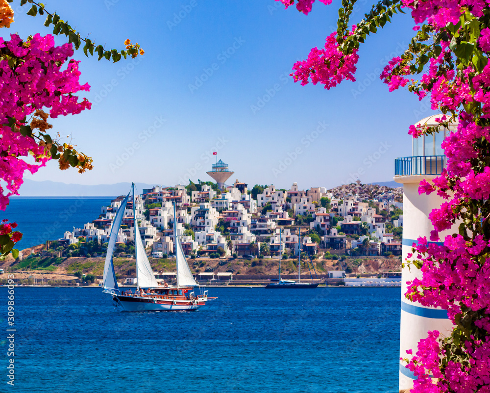 Beautiful pink and purple flowers frame a sea view in Ortakent, Bodrum, Turkey - obrazy, fototapety, plakaty 