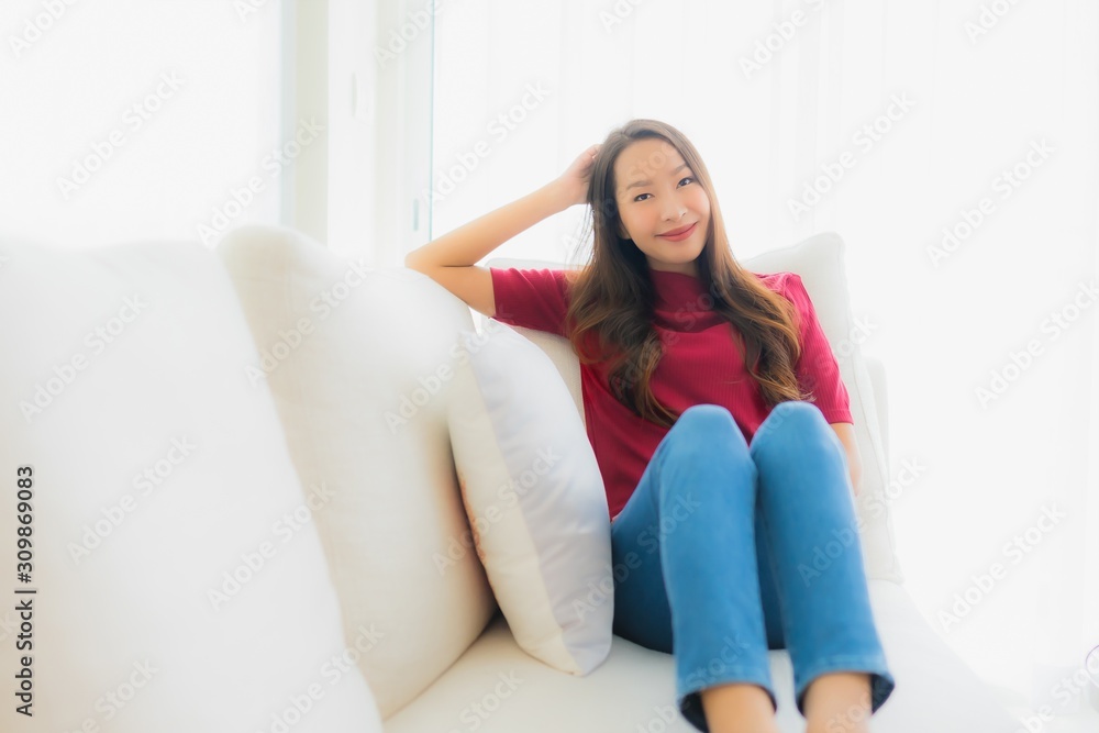 Portrait beautiful young asian women happy smile sit on sofa Portrait beautiful young asian women happy smile sit on sofa