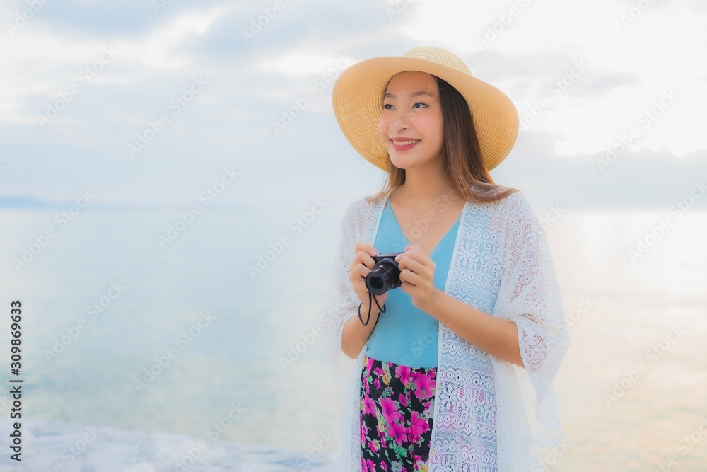 Portrait beautiful young asian women happy smile relax around sea beach ocean