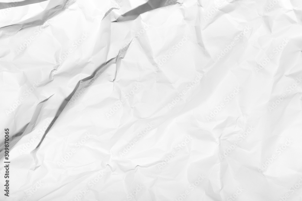 Obraz premium White crumpled paper texture background.