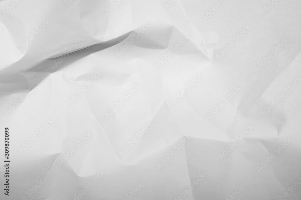 Obraz premium White crumpled paper texture background.