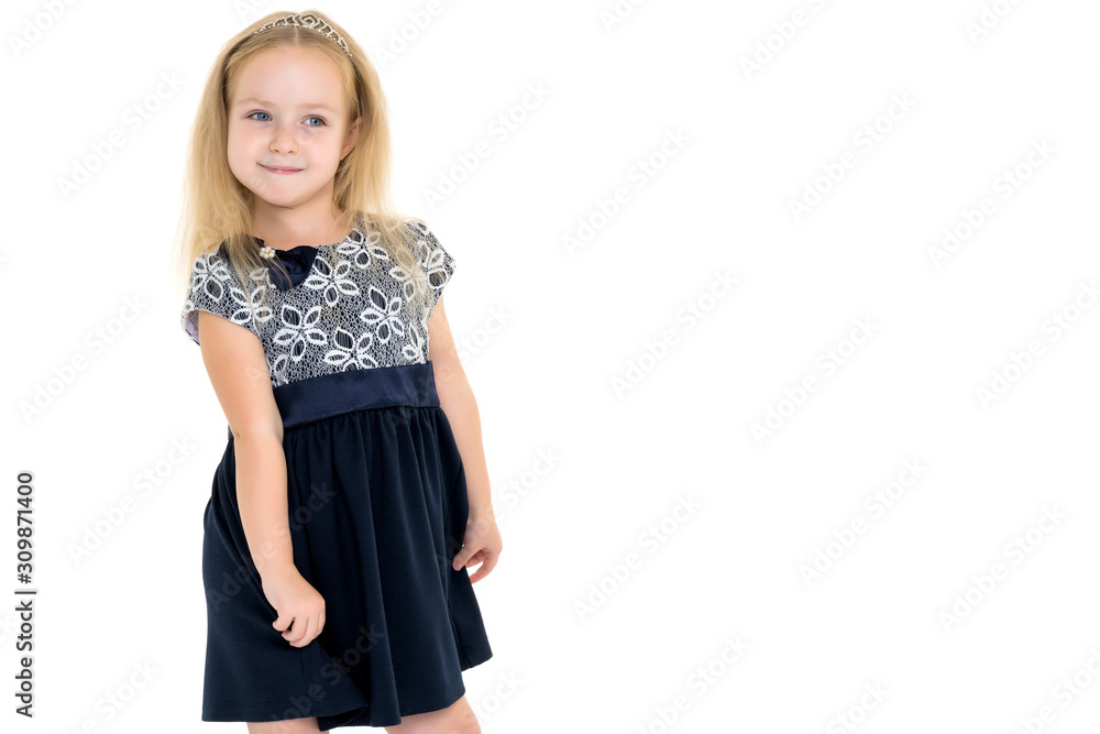 Fototapeta premium Little girl posing in studio on a white background.