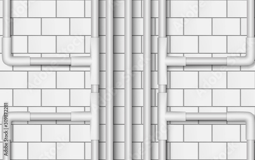 white water pipe on the white block wall