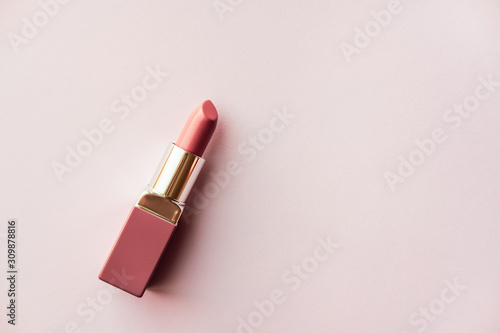 Lipstick on pink background.