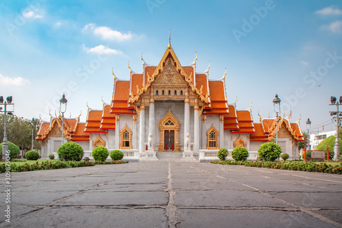 Wat Benchamabophit or Wat Ben is an important buddhist temple  and a famous tourist destination at bangkok in thailand. © Thasist