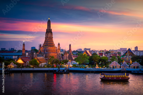 Atmosphere Of  Wat Arun in twilight, It is spectacular, This is an important buddhist temple  and a famous tourist destination at bangkok in thailand. © Thasist