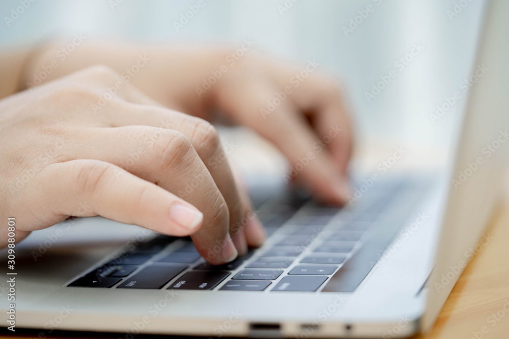 Close up hands typing on laptop keyboard. Close up hands typing on laptop keyboard.