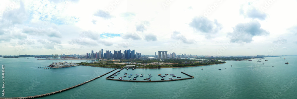View from above, stunning panoramic view of the Singapore skyline during a cloudy day. Singapore is an island city-state off southern Malaysia
