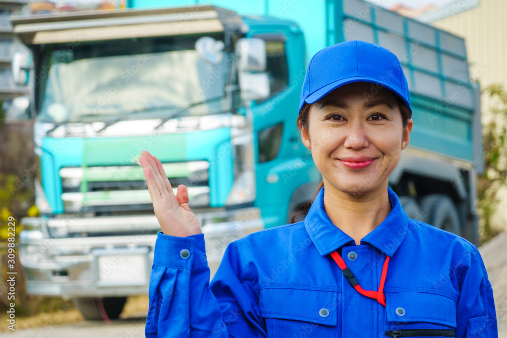 青色の作業服を着た女性 Stock Photo Adobe Stock