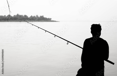 Fisherman with a fishing rod - Negombo Sri Lanka 