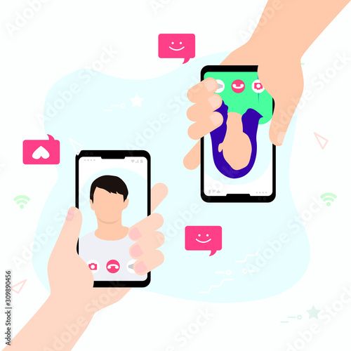 Female hand holding smartphone with boyfriend on screen.Video call concept. Video call with loved one.