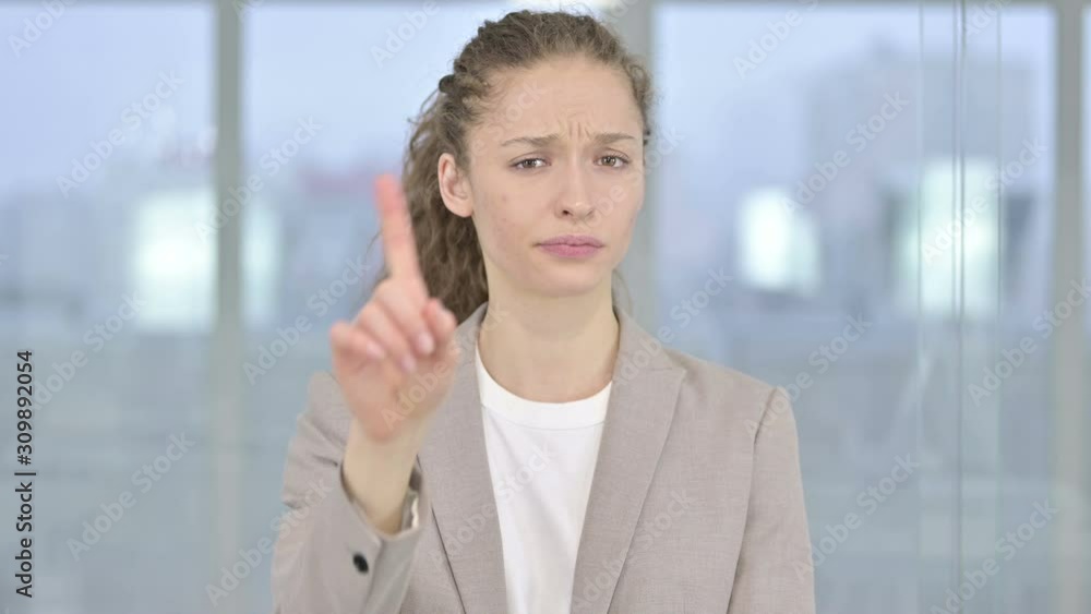 Portrait of Attractive Young Businesswoman saying No by Finger Portrait of Attractive Young Businesswoman saying No by Finger