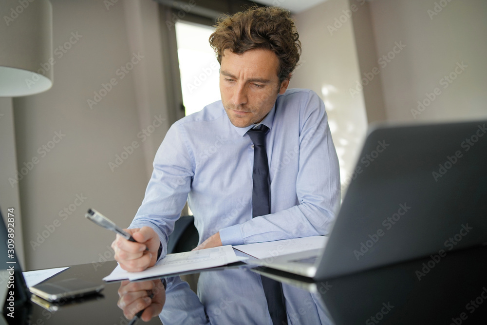 Businessman working on laptop meeting room Businessman working on laptop meeting room