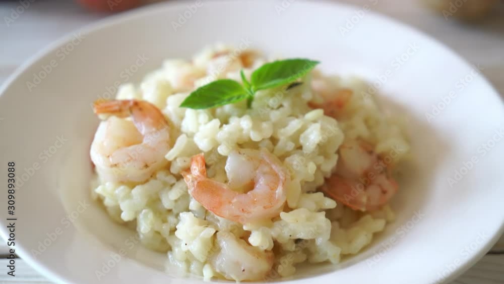 Italian risotto with shrimps - Italian food style Italian risotto with shrimps - Italian food style