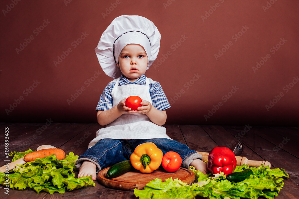 little boy Cook carrots, peppers, tomatoes, lettuce, little boy Cook carrots, peppers, tomatoes, lettuce,