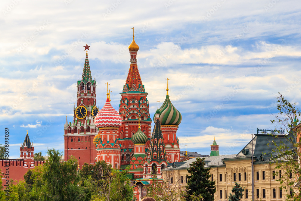 View of St. Basil's Cathedral and Spasskaya tower of Kremlin on Red Square in Moscow, Russia View of St. Basil's Cathedral and Spasskaya tower of Kremlin on Red Square in Moscow, Russia