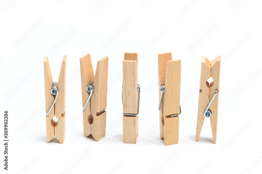 Brown wood clothes peg or clothespin on white background. - Image Brown wood clothes peg or clothespin on white background. - Image