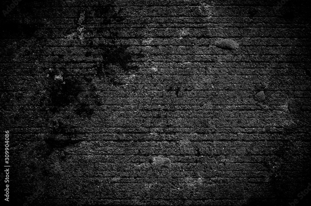 Obraz premium Wall grunge black concrete with light background. Dirty wall concrete blackboard texture and splash or abstract background.