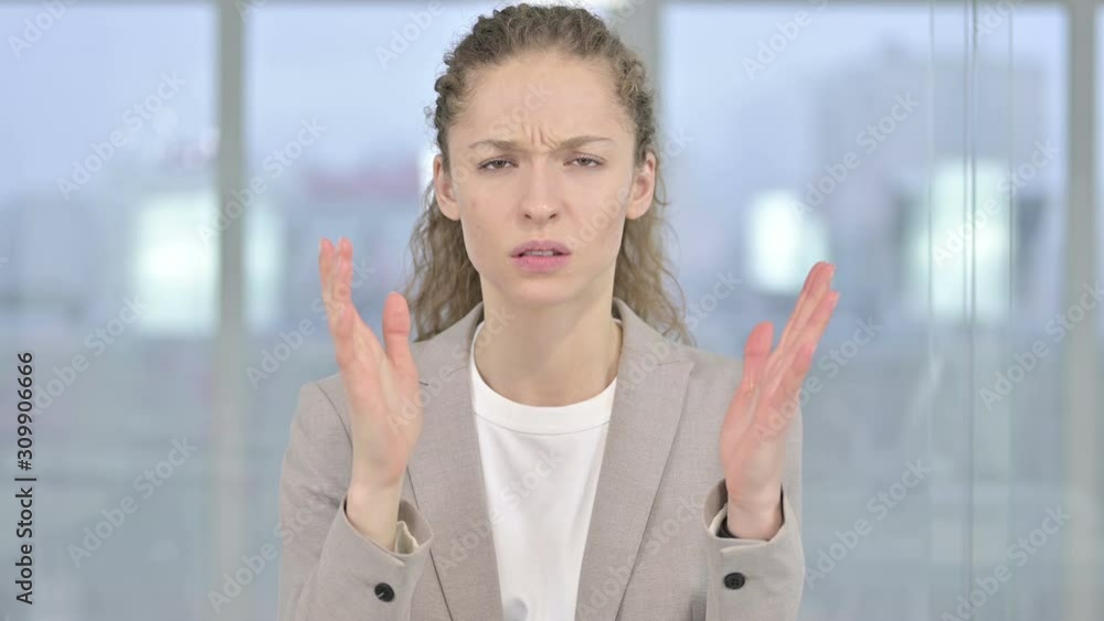 Portrait of Disappointed Young Businesswoman feeling Angry Portrait of Disappointed Young Businesswoman feeling Angry