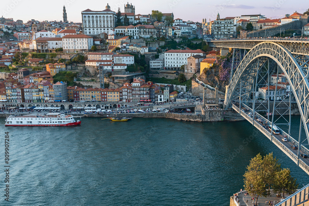 view from the hill to the Douro River and the beautiful Ponte Luis I Iron Bridge in the Portuguese city of Porto