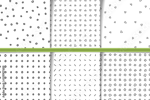 Set of abstract hand drawn monocolor seamless patterns