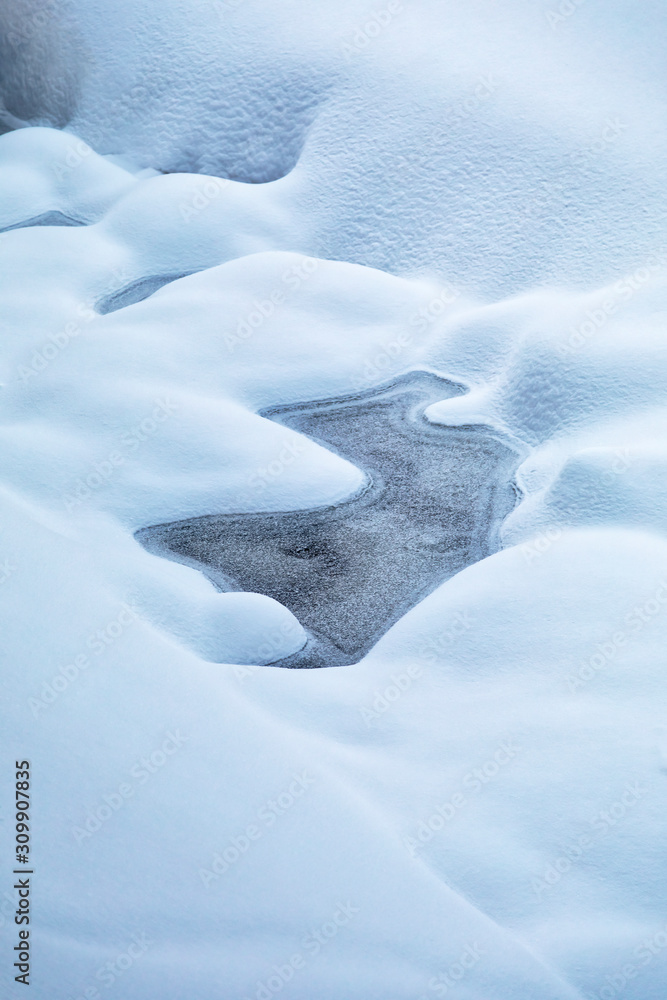 Frozen forest stream covered with snow. Image Frozen forest stream covered with snow. Image