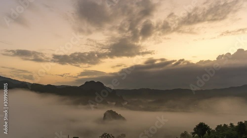Wallpaper Mural The morning fog on the eastern side saw the movement of orange clouds hitting the sun at Phu Lanka, Phayao Province, Thailand. Torontodigital.ca