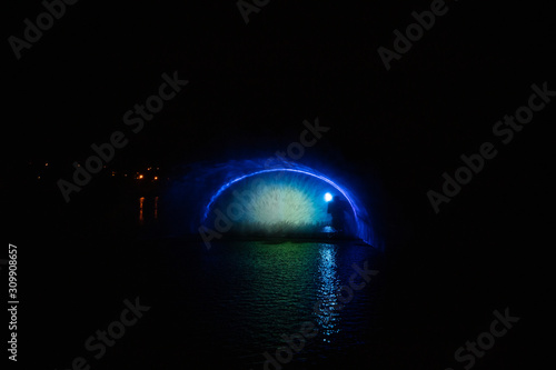 Fototapeta Naklejka Na Ścianę i Meble -  Multimedia Fountain Roshen, built on the river Southern Buh near Festivalny Isle (Kempa Isle)