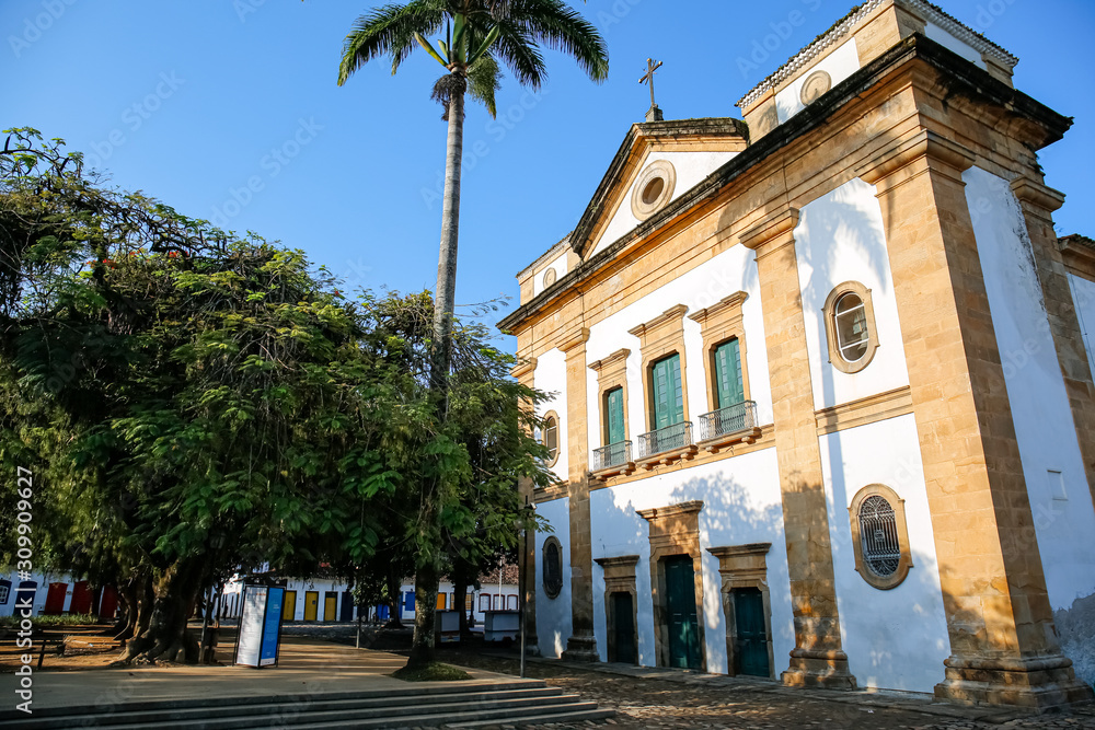 View to church Matriz de Nossa Senhora dos Remedios (Church of Our Lady of Remedies) with blue sky in historic town Paraty, Brazil, Unesco World Heritage