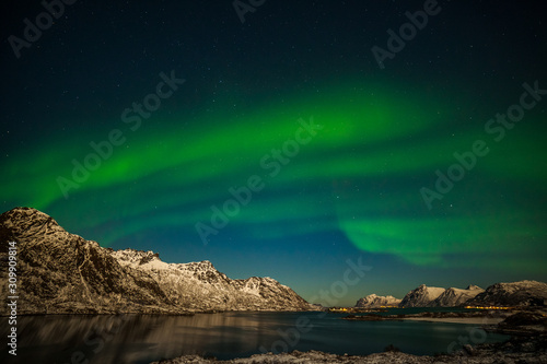 aurora borealis, polar lights, over mountains in the North of Europe - Lofoten islands, Norway © Tatiana